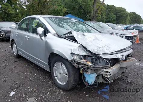 2006 Honda Civic Hybrid from USA, damaged, VIN JHMFA36216S013613